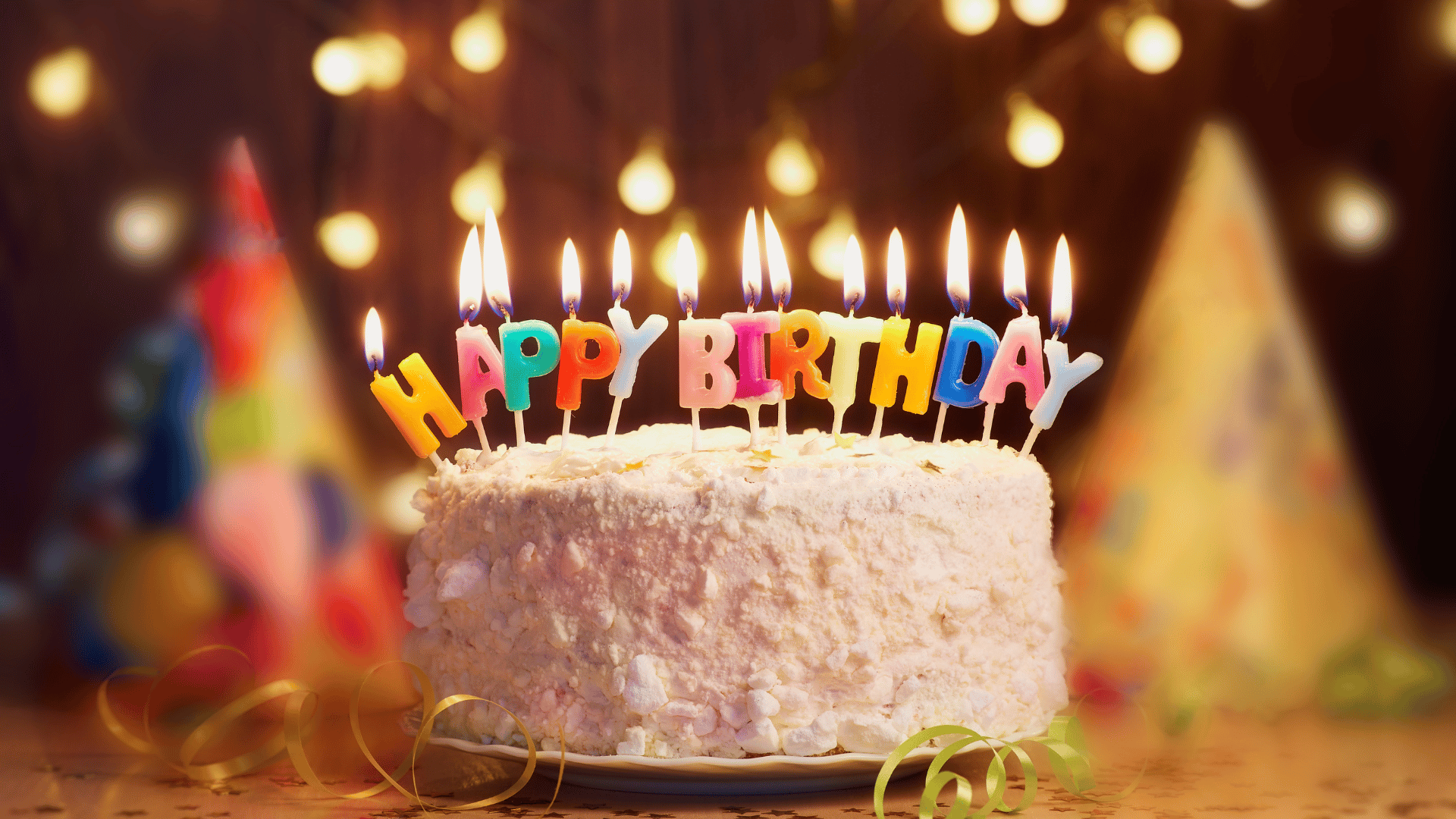 birthday cake with happy birthday candles