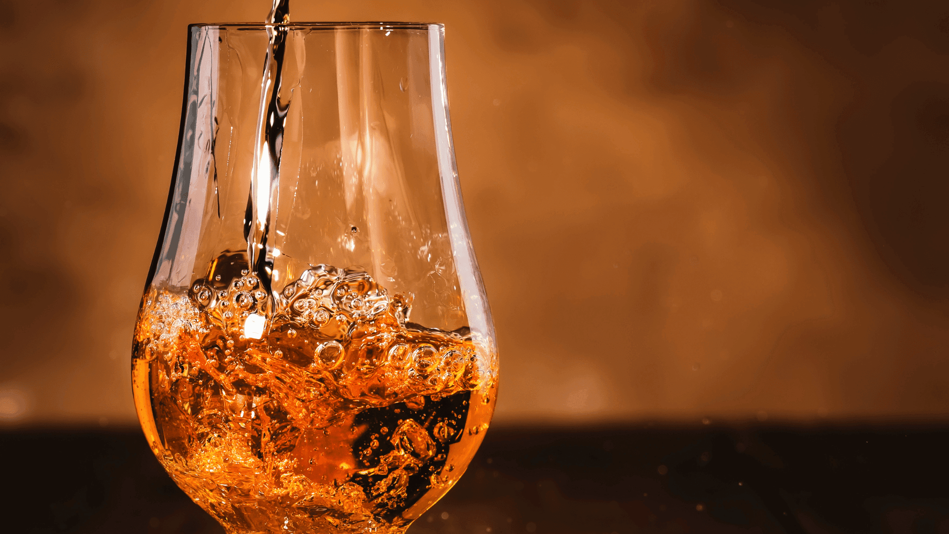 Scotch being poured into a glass